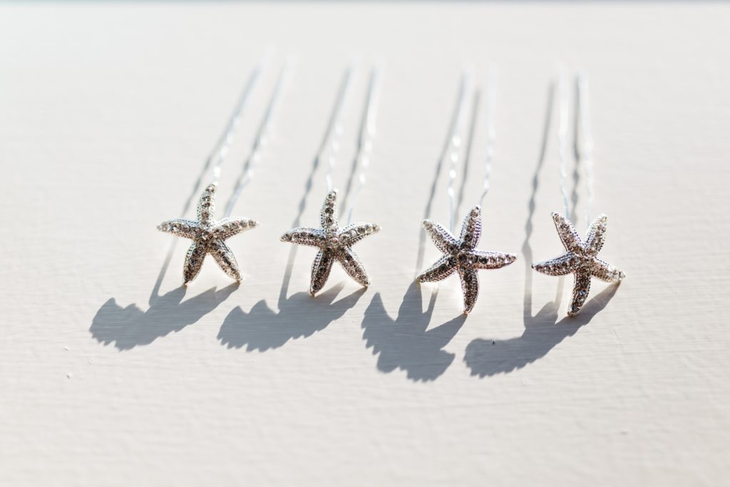 Starfish hairpins cast palm tree shaped shadows